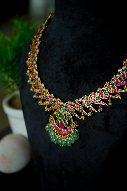 Jadau Kundan Necklace set with Peacock style earrings.