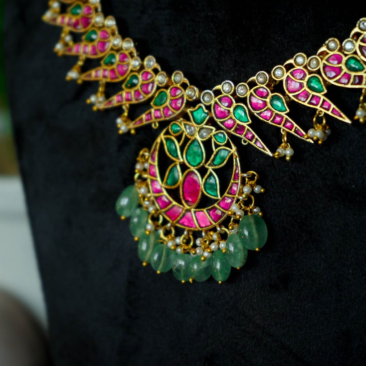 Jadau Kundan Necklace set with Peacock style earrings.
