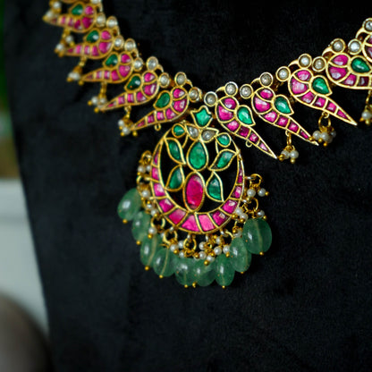 Jadau Kundan Necklace set with Peacock style earrings.